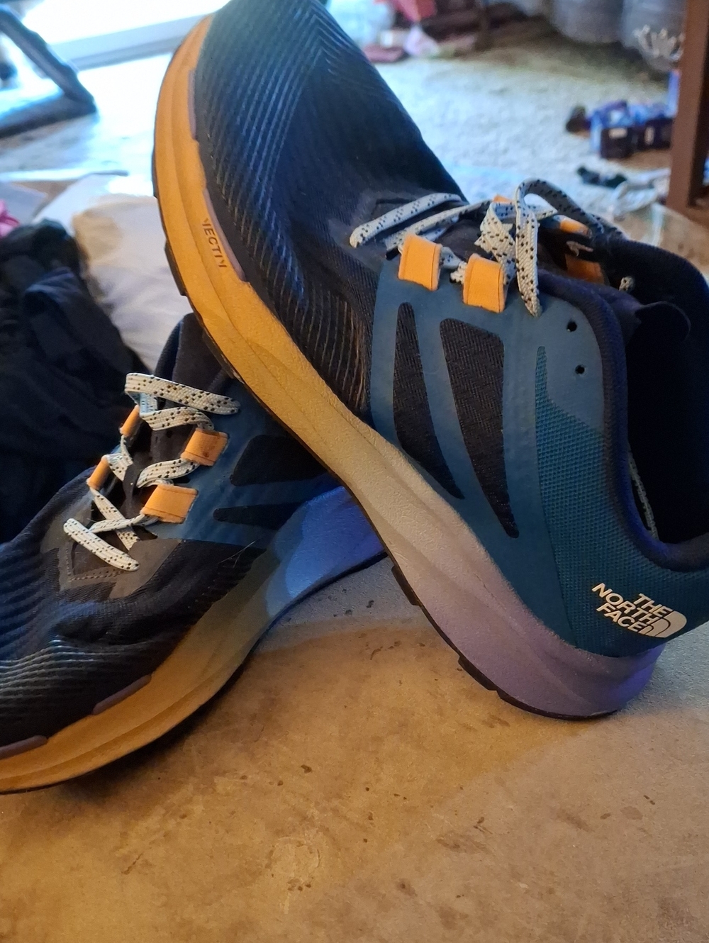 The North Face Men’s Blue and Yellow Running Shoes